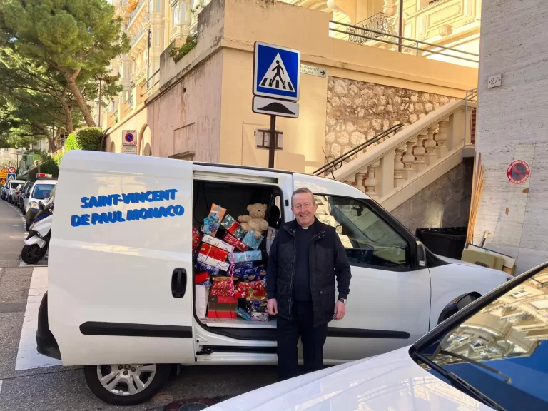 With van from St Vincent de Paul taking Christmas gifts to Nice – Caritas Humanitrian – plus bear!